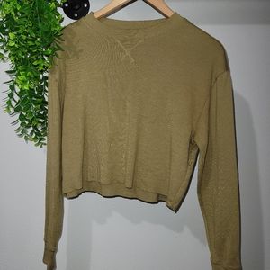 Cropped green sweater